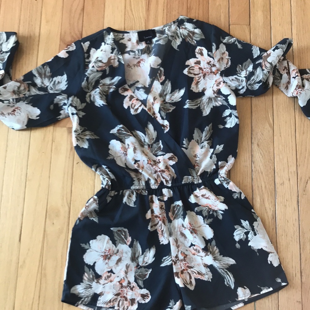 Long sleeved floral romper